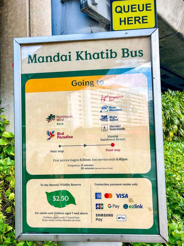 Which Mandai Wildlife Park Should You Visit? I Tried All Five 46 Bus stop sign for Mandai Khatib Bus shows route information, ticket price, contactless payment options, and service times to Mandai Wildlife Reserve attractions.